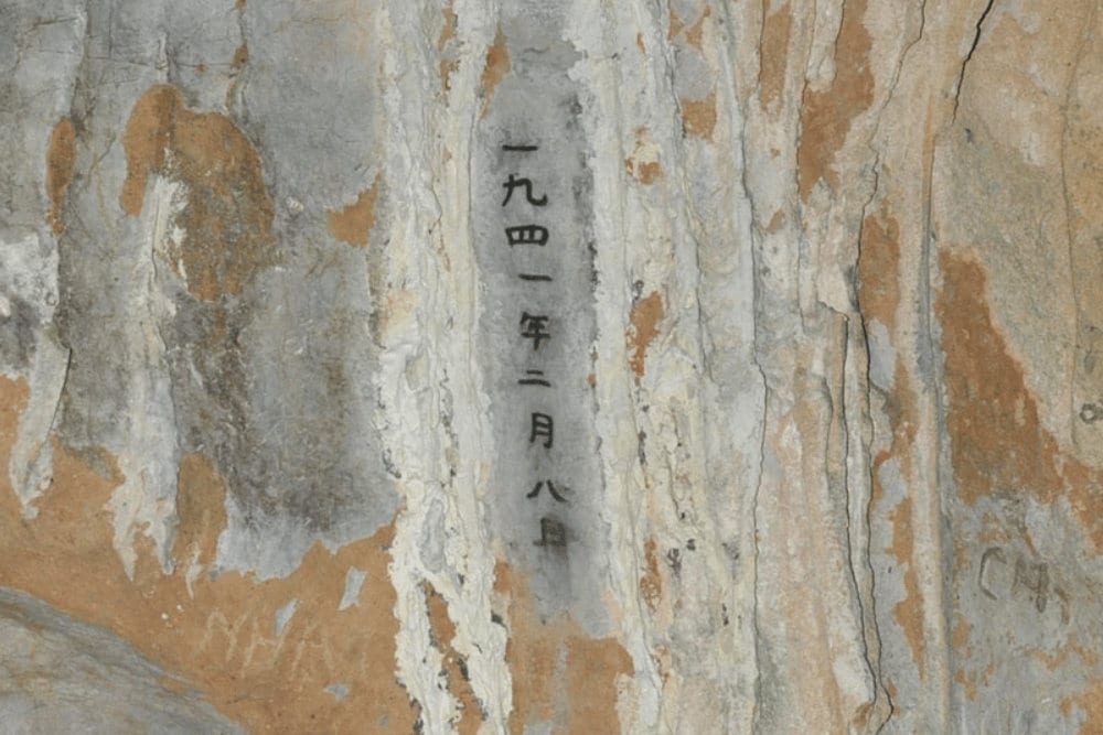 Visitors can still see Uncle Ho’s charcoal inscription marking the exact date he arrived at Coc Bo Cave in 1941